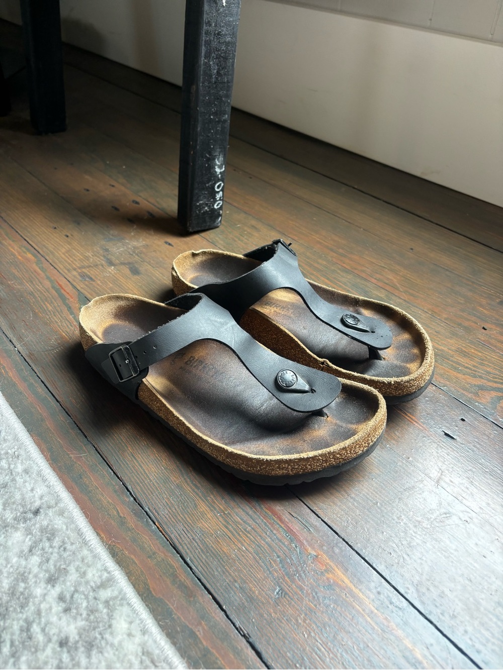 Birkenstock Black Thong Sandals with Contoured Cork Footbed